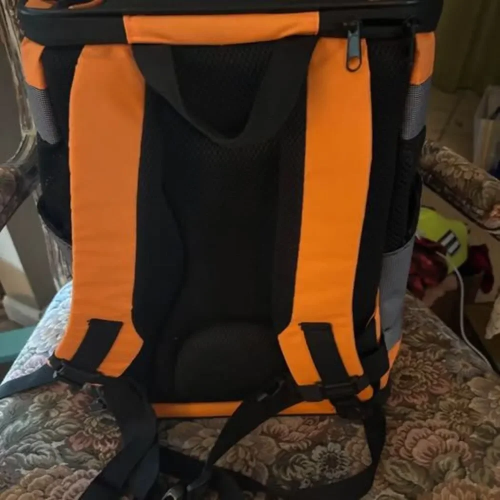 Orange and black soft-sided pet carrier, about 18x12x9 inches